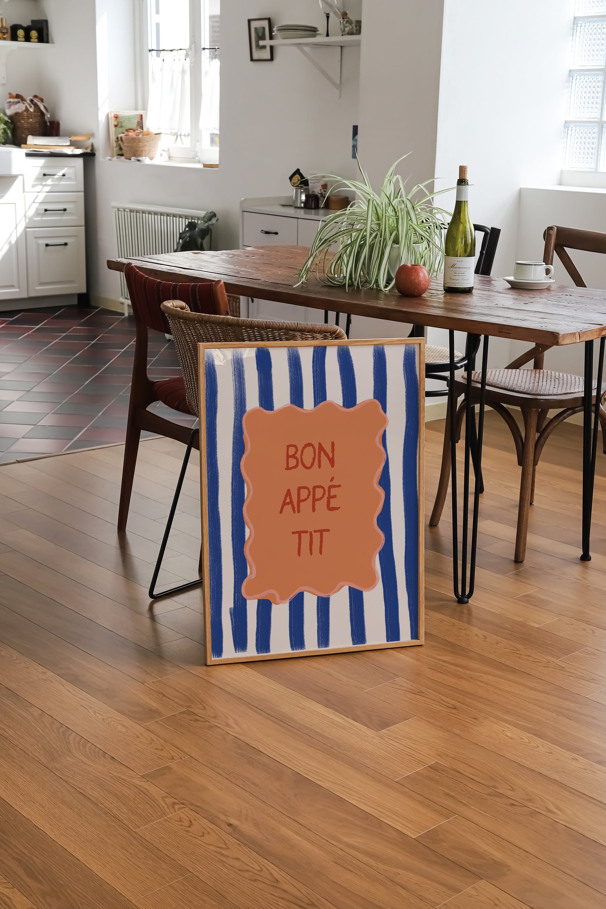 a sign that says bon appe ti on a wooden floor