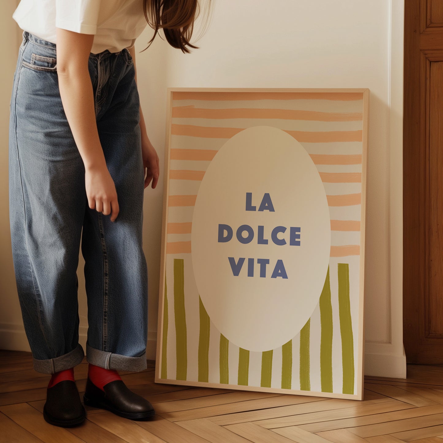 a woman standing next to a sign that says la dolce vita