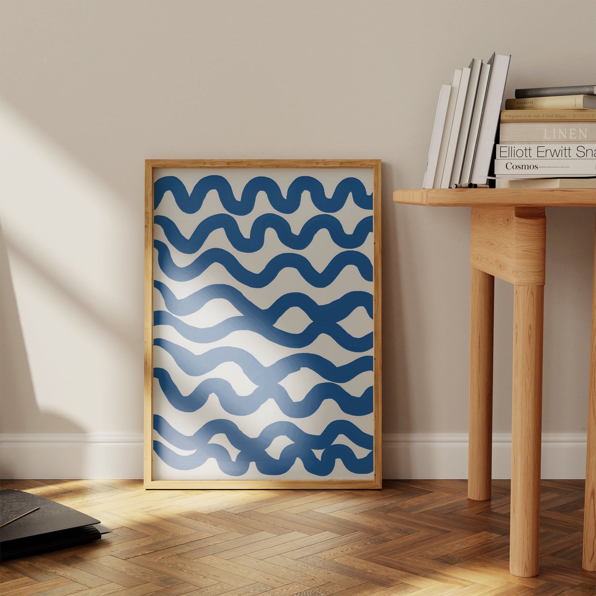 a picture of a blue and white wave pattern on a wall