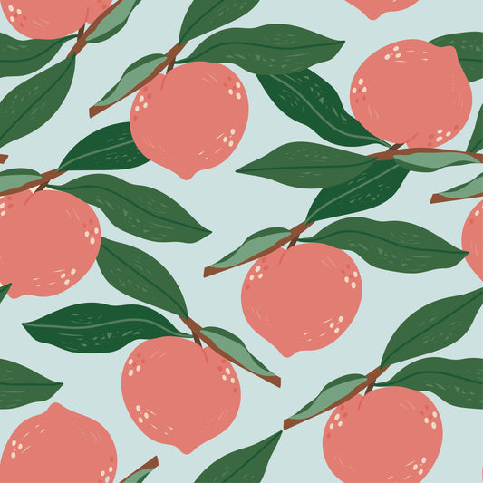 a pattern of peaches with leaves on a blue background