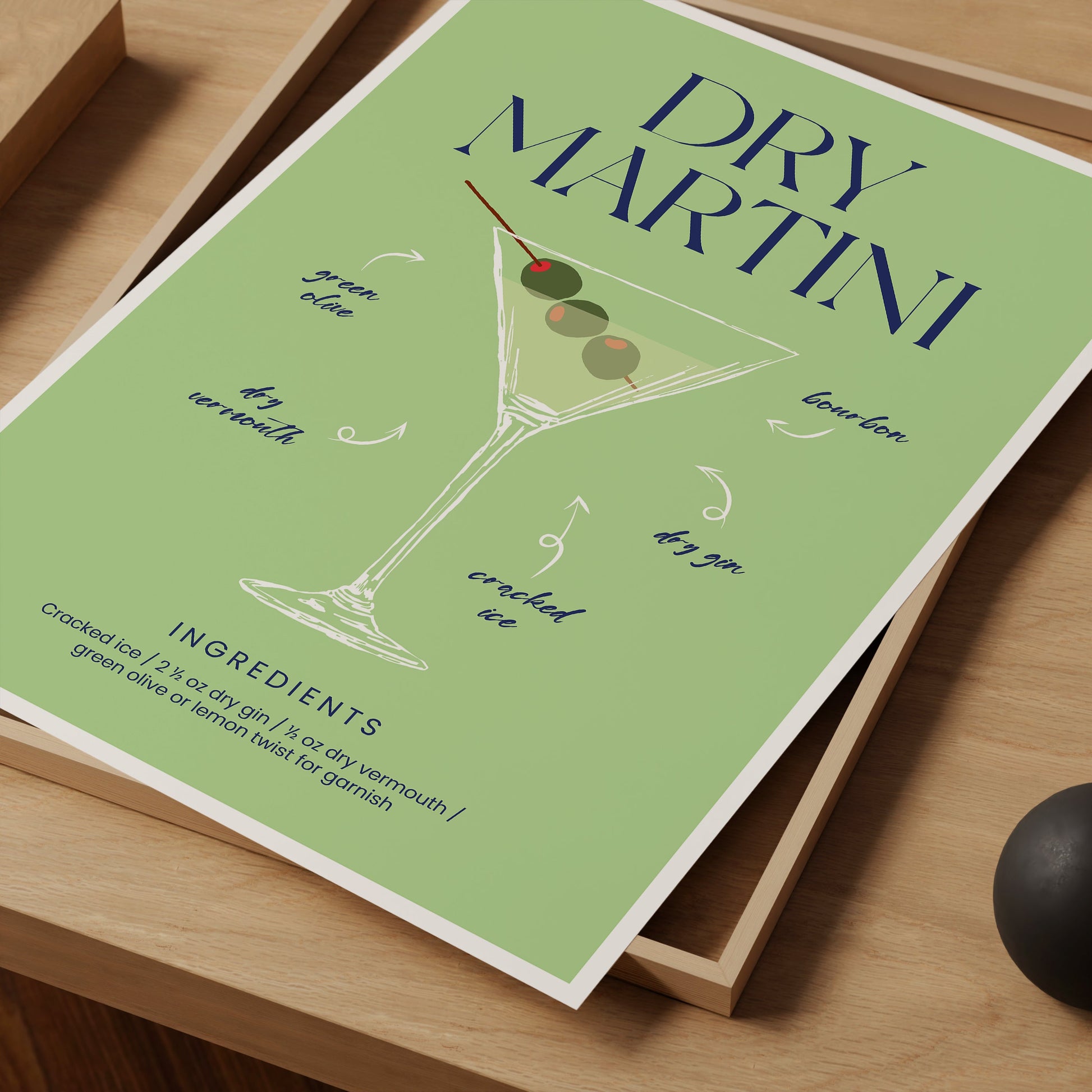 a poster of a martini on a table