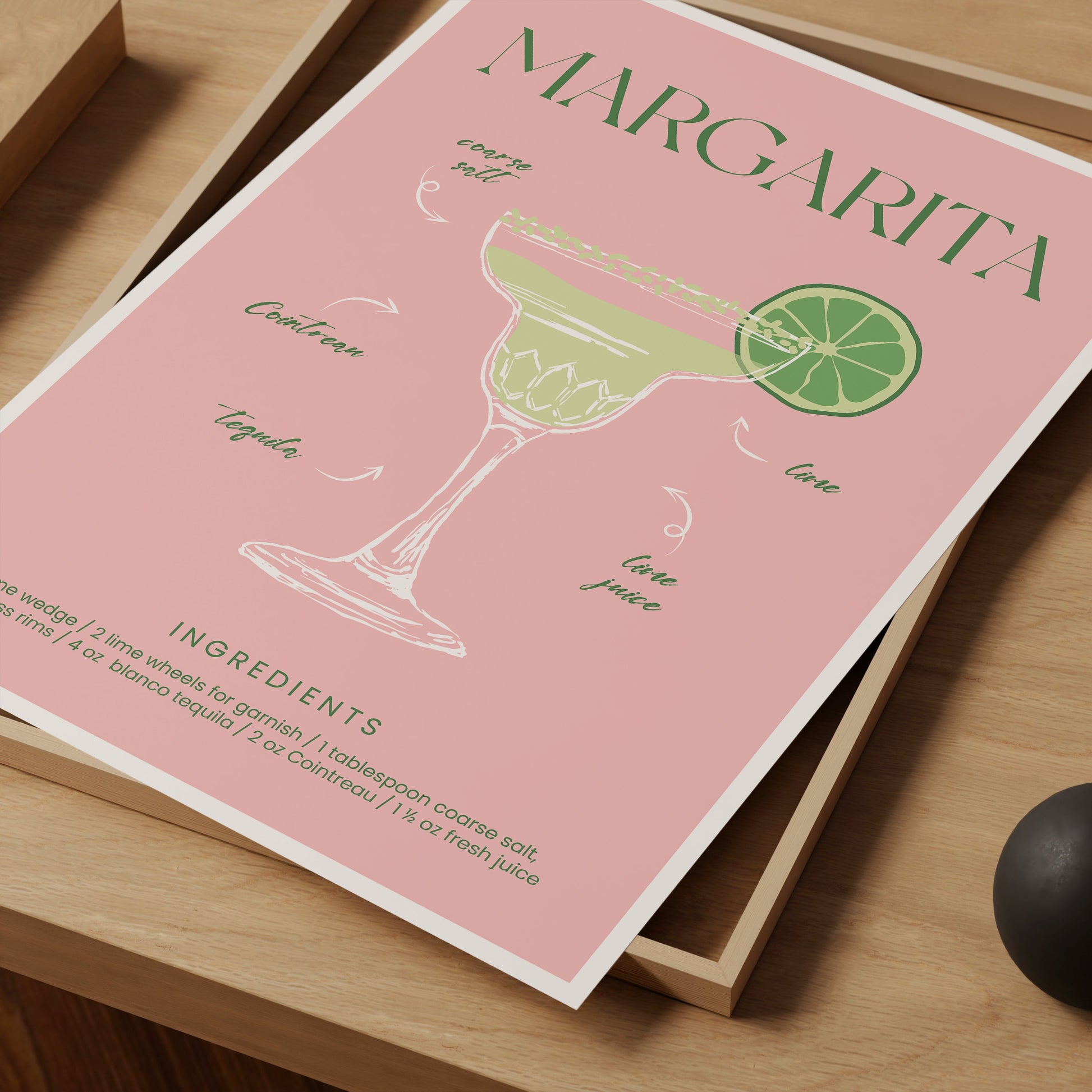 a pink poster with a lime margarita on it