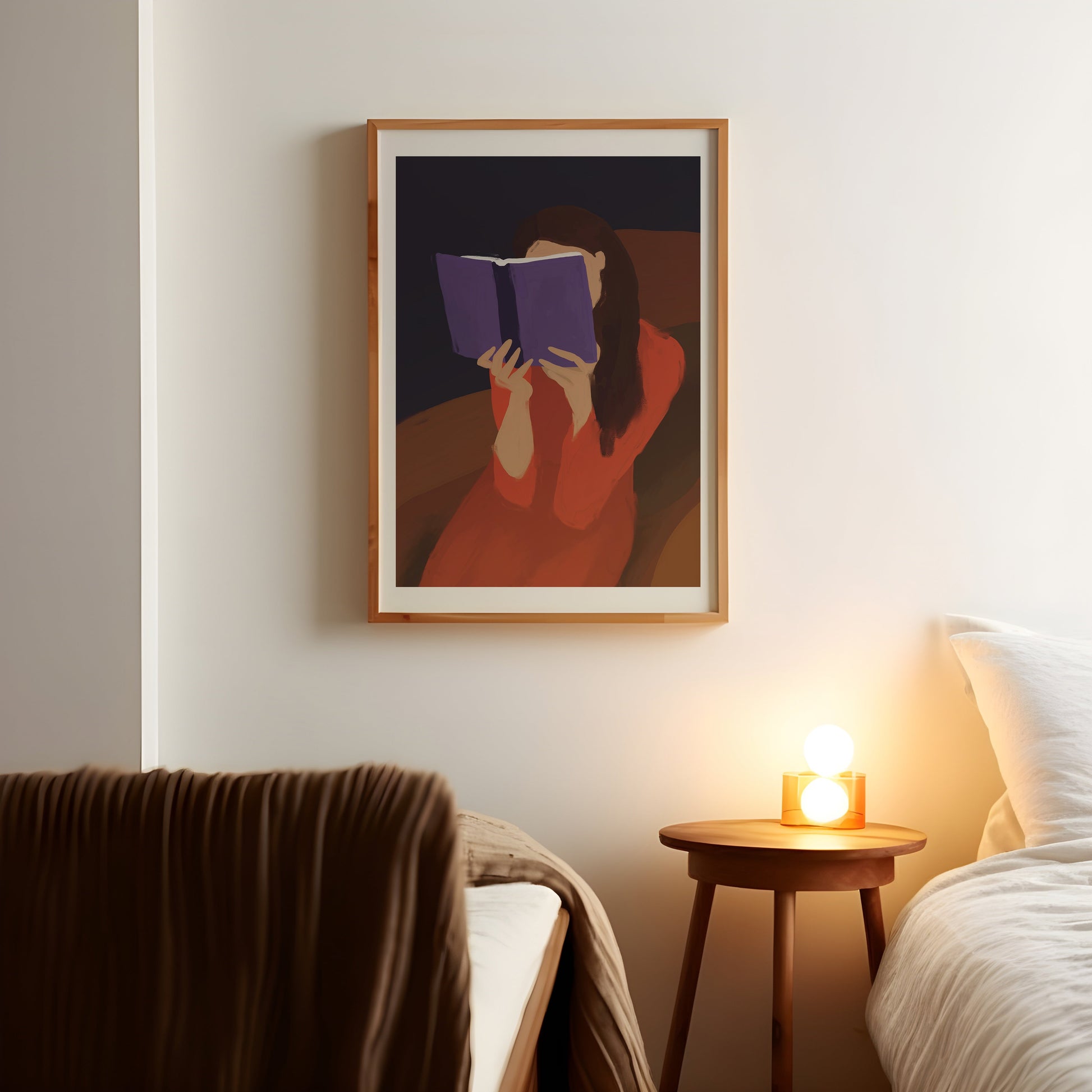 a picture of a woman reading a book in a bedroom