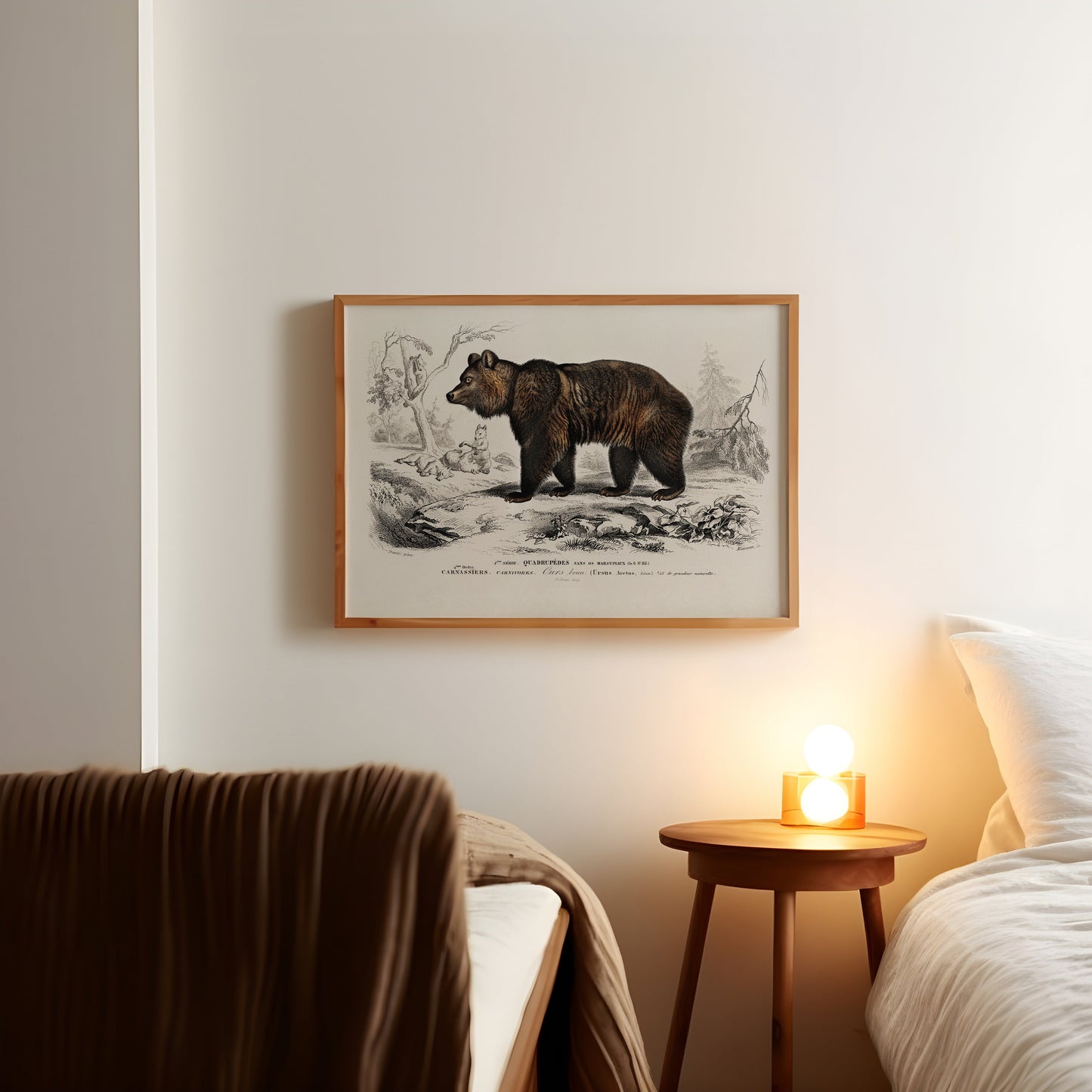 a picture of a bear on a wall above a bed