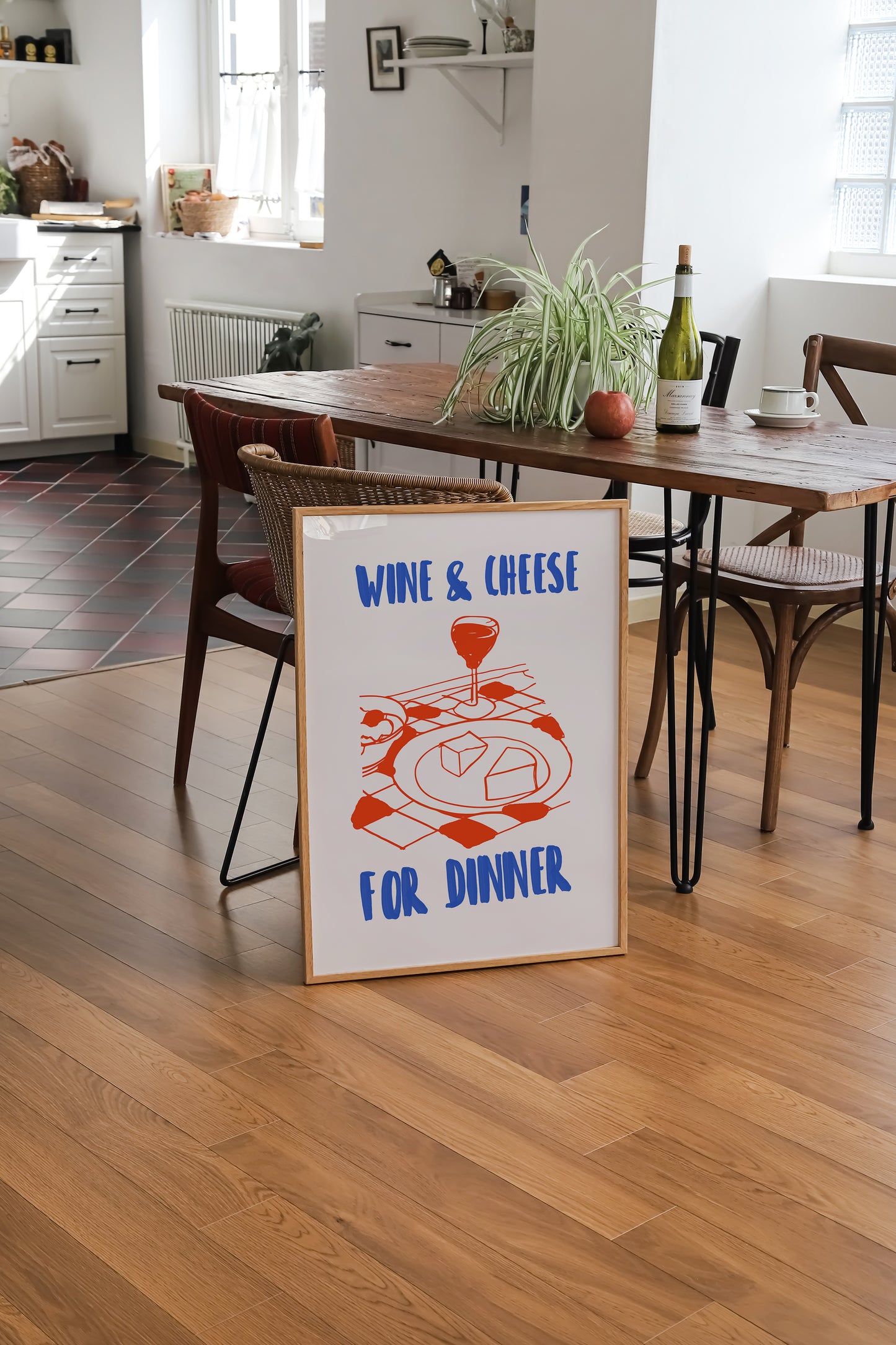 a wine and cheese for dinner sign sitting on the floor