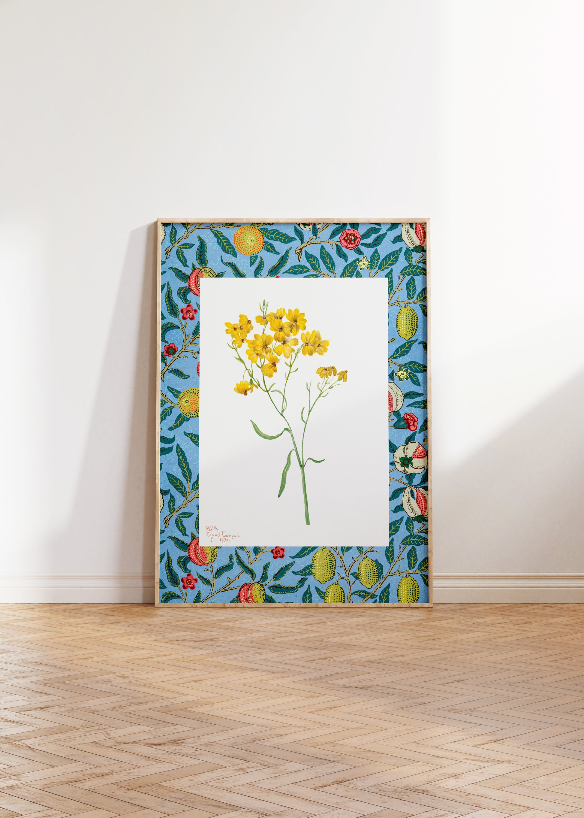 a picture of a yellow flower in a blue frame