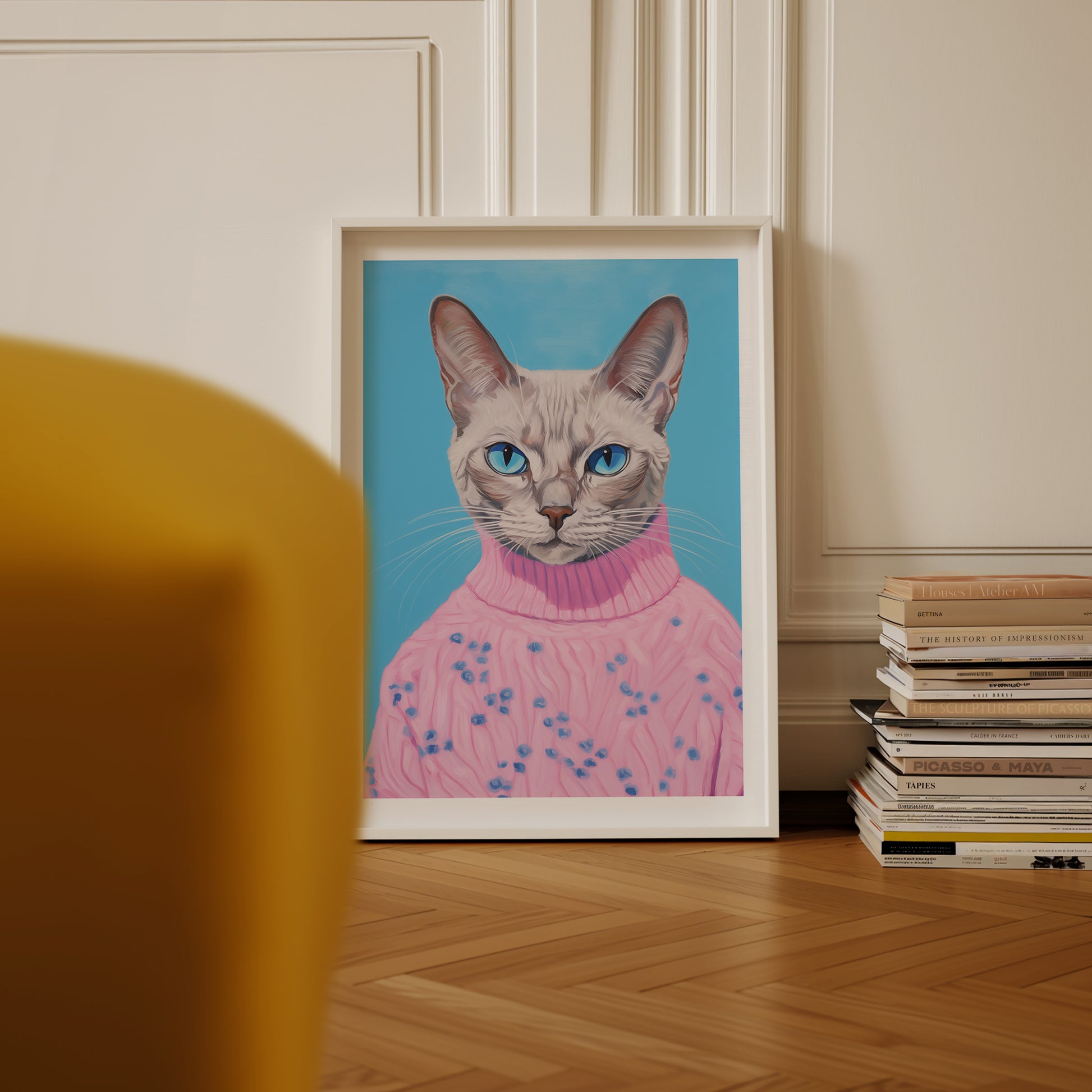 a picture of a cat wearing a pink sweater