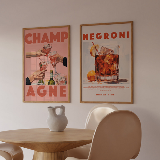 a table and chairs in a room with posters on the wall