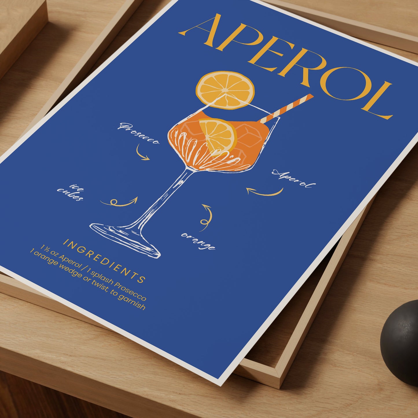 a poster of a drink on a table