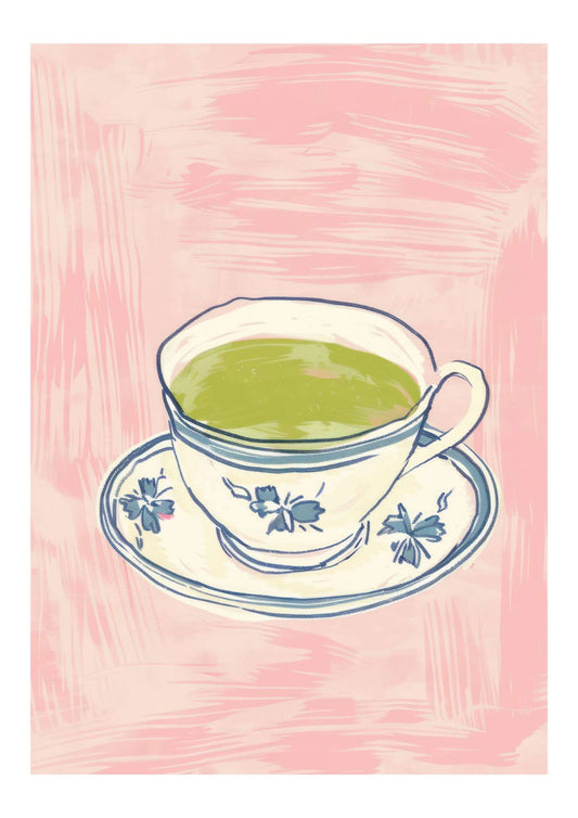 a cup of green tea on a saucer