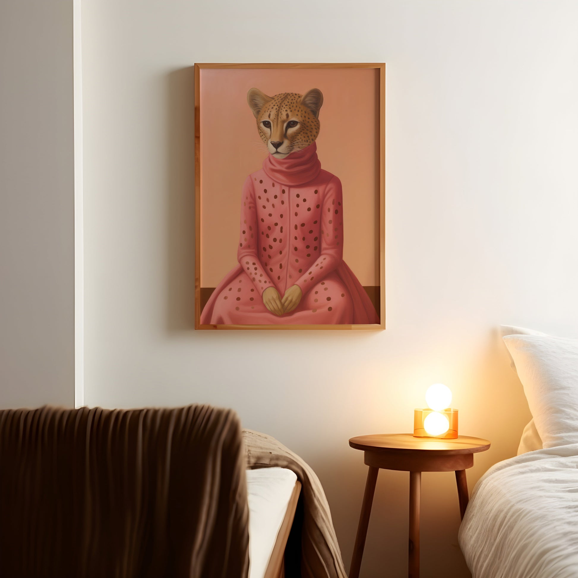 a picture of a cat in a pink dress on a wall above a bed