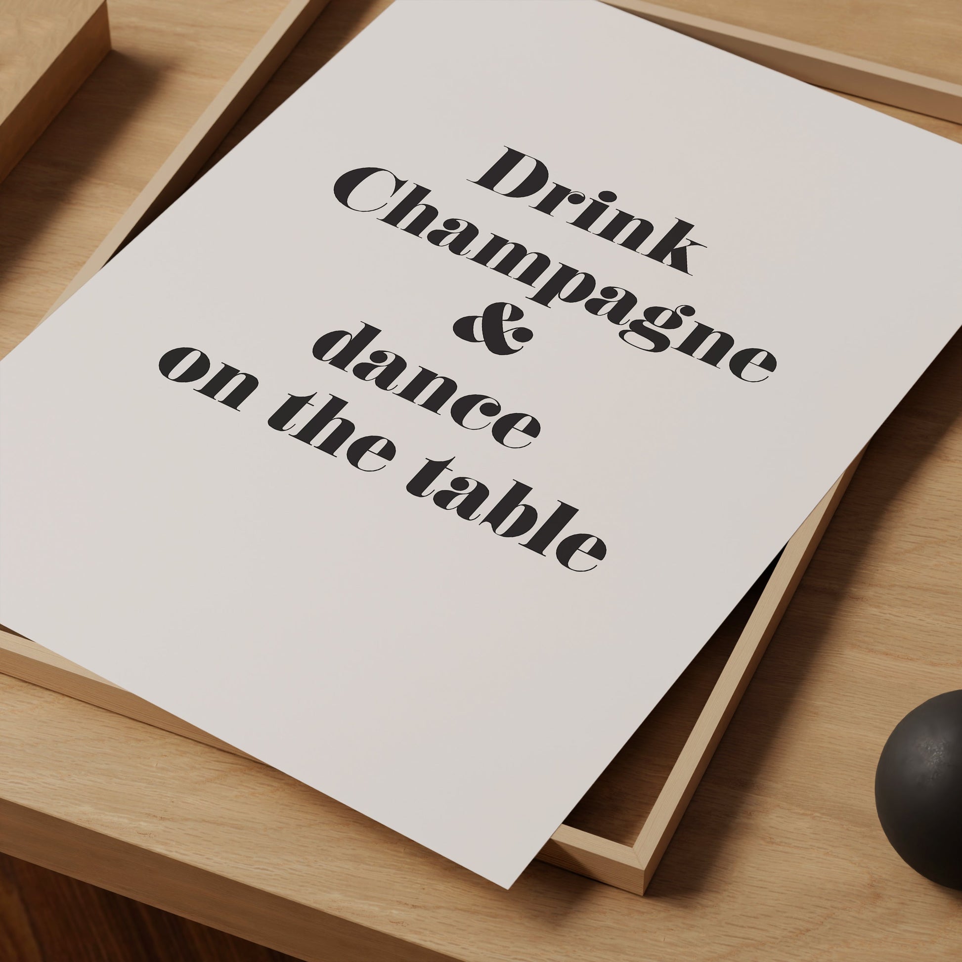 a piece of paper that says drink champagne and dance on the table