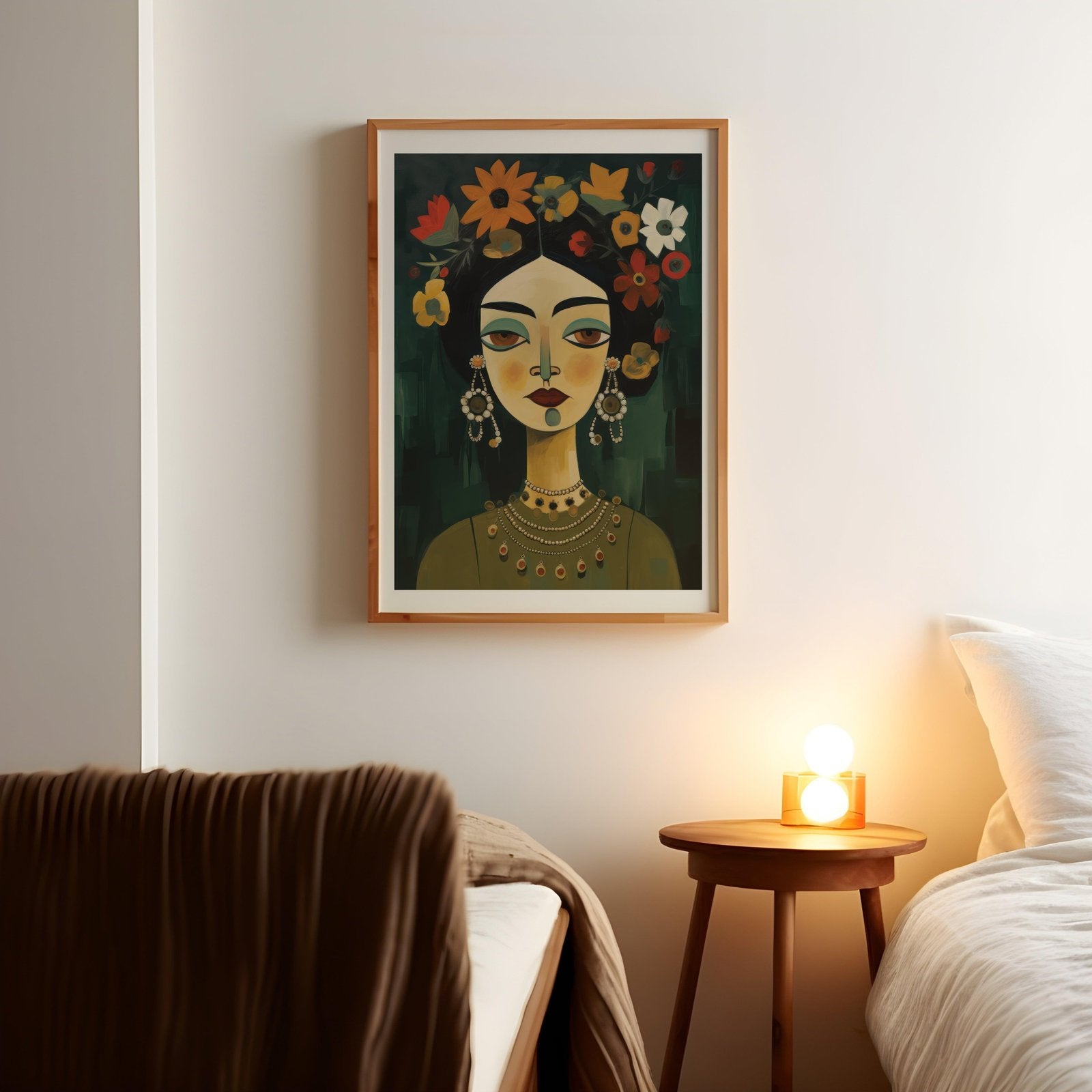 a picture of a woman with flowers on her head hangs above a bed